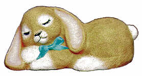 #2381 Cute Bunny Laying  3 1-2"